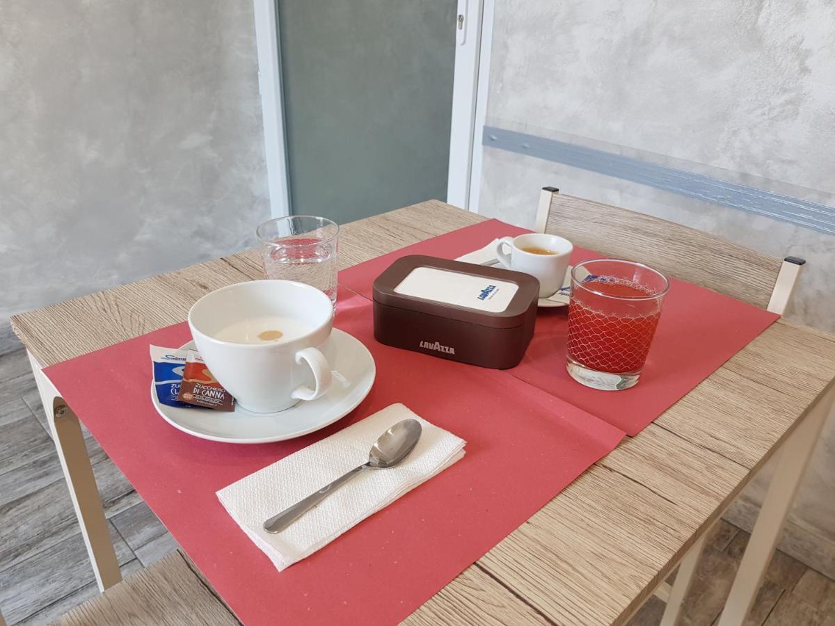 Apple Rooms Rome Airport Fiumicino Exterior photo A typical Italian breakfast